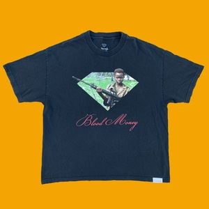 Diamond gun in hand tee